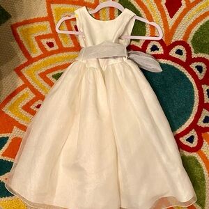 Elegant Ivory Kids Dress with Matching Sash Plus an Extra Platinum Colored Sash